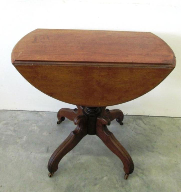 ANTIQUE DROP LEAF TABLE: 30 1/2 tall. 33" X 18" wide without leaves. Each leaf 9 1/2" long.