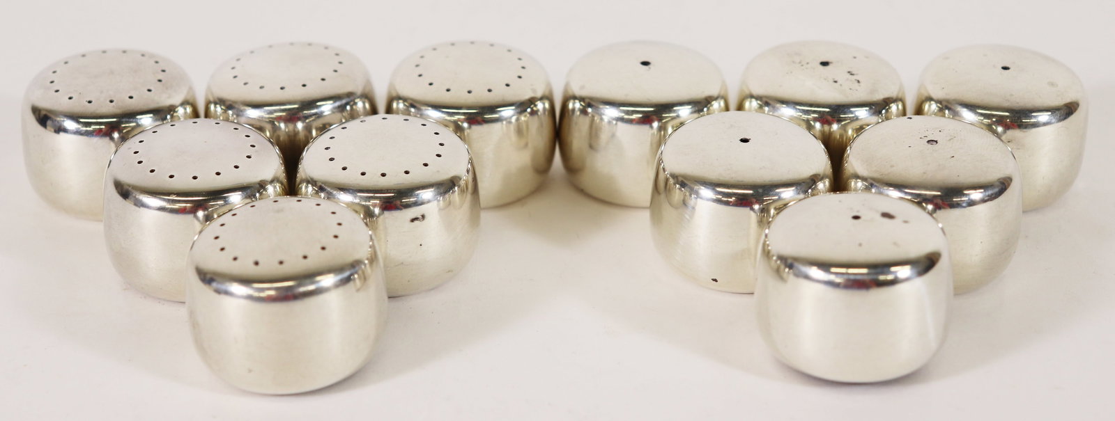 (6) GEORG JENSEN HENNING KOPPEL STERLING SHAKERS: (6) Sets of Georg Jensen Henning Koppel Denmark sterling silver #1135 salt and pepper shakers. 293.6 g.