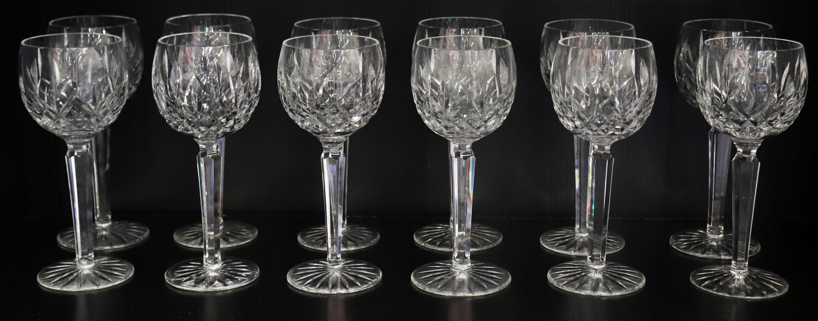 (12) WATERFORD CRYSTAL LISMORE BALLOON WINE: Set of 12 Waterford Crystal Lismore balloon hock wine goblets. Measures 7 1/2" tall.