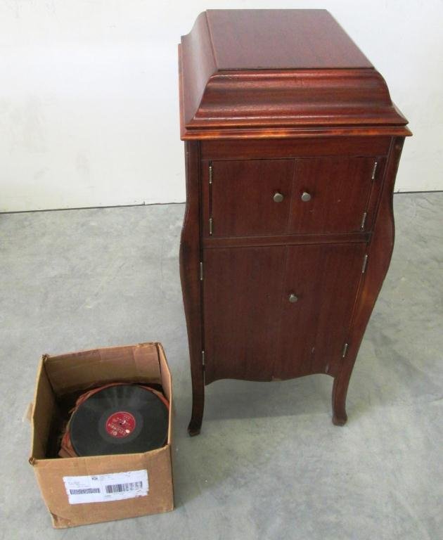 VICTOR VICTROLA TALKING MACHINE WITH RECORDS: Comes with a variety of records. 42" Tall 18 1/2" x 21 1/2" wide.