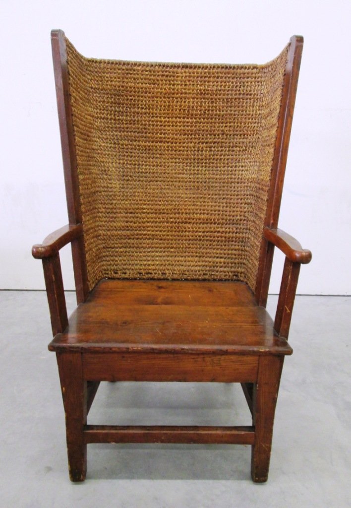 19TH CENTURY ORKNEY OAK STRAW BACKED CHAIR: Liberty & Co. London label. Arts and crafts movement. 41 1/2" Tall 24" wide and 16 1/4" deep. Weave needs to be re-stitched on top of chair.