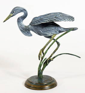 GEOFFREY C. SMITH BRONZE BLUE HERON SCULPTURE: Geoffrey C. Smith (b. 1961) Patinated bronze sculpture of a blue heron balancing on a green base. Signed and numbered 98/100 on base and dated 93'. Measures 6.25" tall 5.5" wide. Geoffrey Smith is an