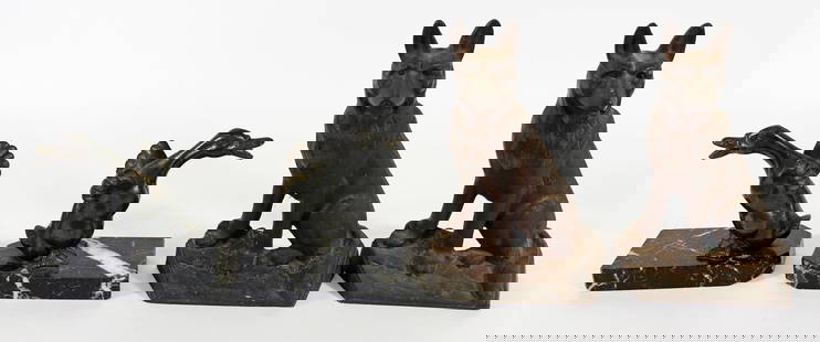 COLLECTION OF BIRD & DOG BOOKENDS DOORSTOPS: A collection bird bookends and cast metal German Shepherd dog bookends or doorstops. Birds 5.5" wide 5.25" tall, dogs 9" tall. From the estate of Andrew Cunningham Ware.