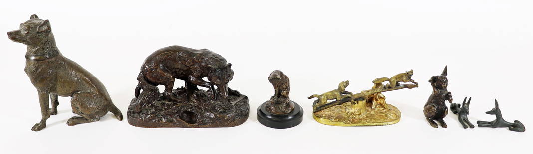 BRONZE DOG SCULPTURES, RABBIT, WOLF & MORE: Collection of assorted animal sculptures including a movable dog chasing animal up branch desk paper holder, seated dog, a wolf signed / attributed to Jules Moigniez, rabbit, and (2) Egyptian metal sp