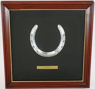 SECRETARIAT HORSESHOE & LETTER CLAIBORNE FARMS: A rare find! A framed horse shoe in a shadowbox frame that is accompanied by a letter from Claiborne Farm in Paris Kentucky and dated 2/20/87 which reads: Dear John, They asked me if you wanted this c