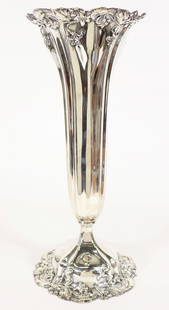 WHITING STERLING SILVER "VIOLET" TALL VASE: An antique sterling silver tulip shaped vase by Whiting Mfg in the violet pattern. It is 15 3/4" tall with a tulip flower design. Stamped sterling 7000 and has the Whiting hallmark. Total weight 740 g