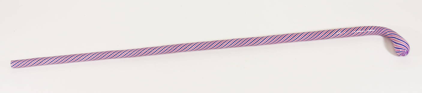 BLOWN GLASS WALKING STICK CANE: Pink, blue, and white swirl glass walking stick cane. Measures 34.5" long. From the estate of Andrew Cunningham Ware.