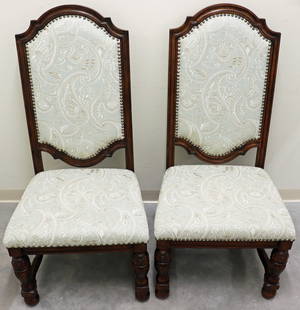(2) VINTAGE HIGH BACK ARMLESS CHAIRS: A pair of carved wood high back armless upholstered chairs. Measures 48" tall x 20" deep x 23" width.
