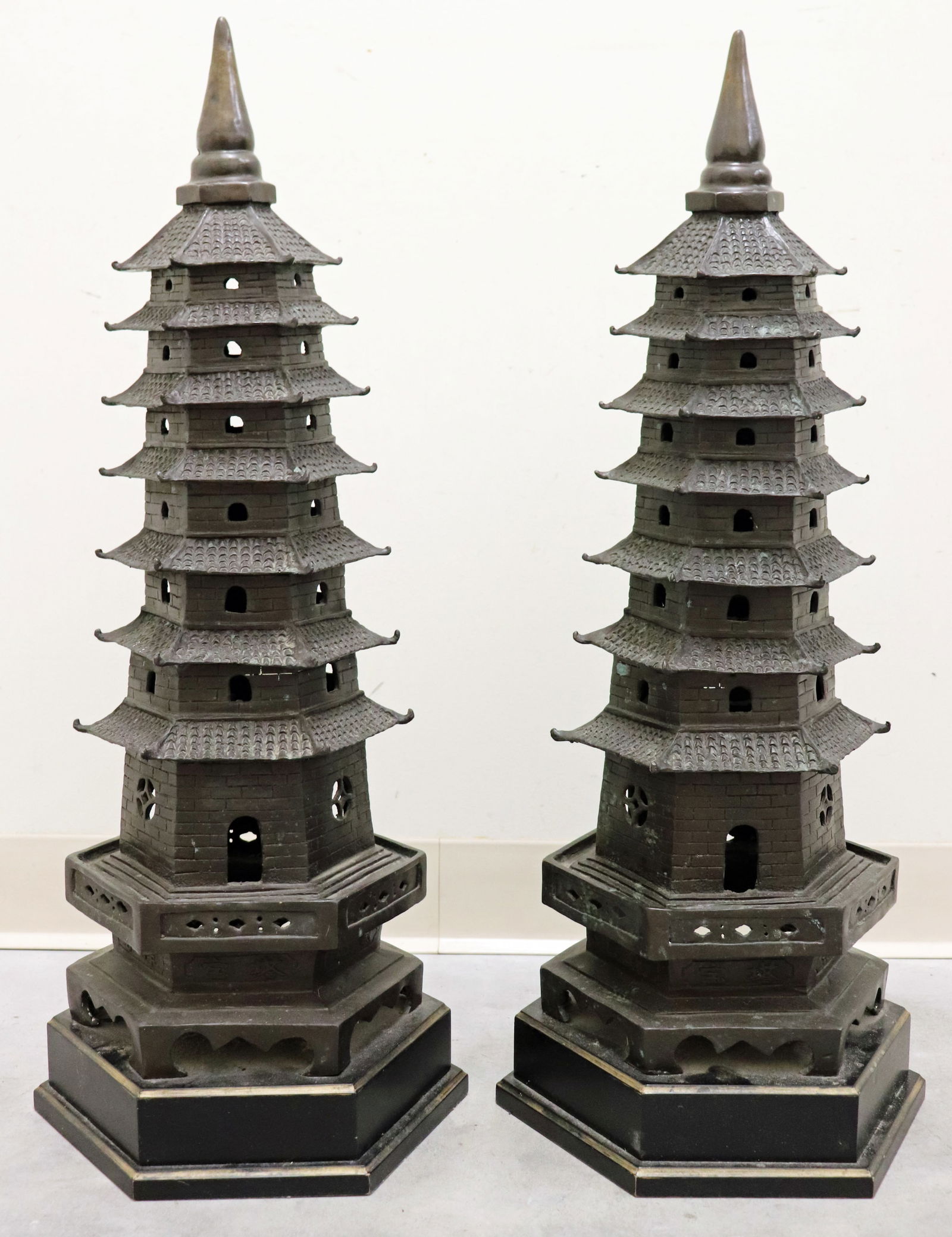 (2) TALL METAL PAGODA SCULPTURES (1 of 4)