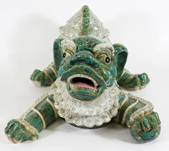 "PLAYFUL" GLAZED FOO DOG SCULPTURE: Chinese glazed pottery foo dog figure in a playful pose. Measures approximately 20" x 15.5" wide 10" tall.
