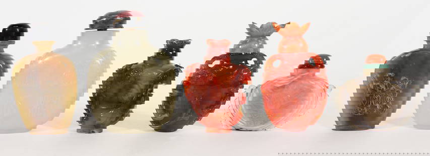 (5) CHINESE AGATE / JADE SNUFF BOTTLES: Collection of agate and jade carved snuff bottles. The agate one has elaborately carved serpents on each side with a lotus flower top. The other has a serpent and flower motif with some chips. The lar