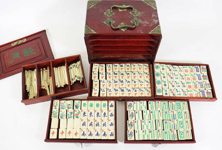 VINTAGE CHINESE MAJHONG SET WITH BOX: A vintage Chinese Mah Jong set that includes 144 tiles with extras. From the Andrew Cunningham Ware Estate.