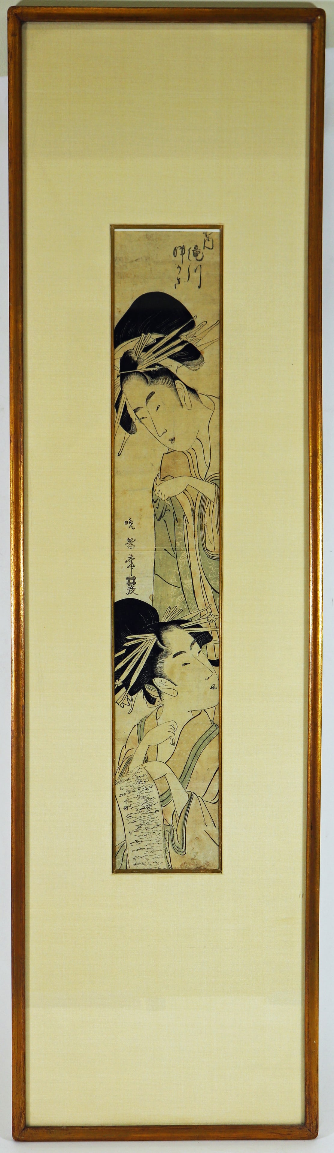 KOIKAWA HARUMASA JAPANESE WOODBLOCK: Koikawa Harumasa (Banki) Japanese woodblock print of two Geisha. Measures 23" x 3.75" (sight) and 40.75" x 11.25" w/ frame.