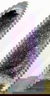 HUGE BRAZILIAN AMETHYST GEODE SPECIMEN: A large purple amethyst crystal cathedral geode. Measures 26" H x 10" x 11"