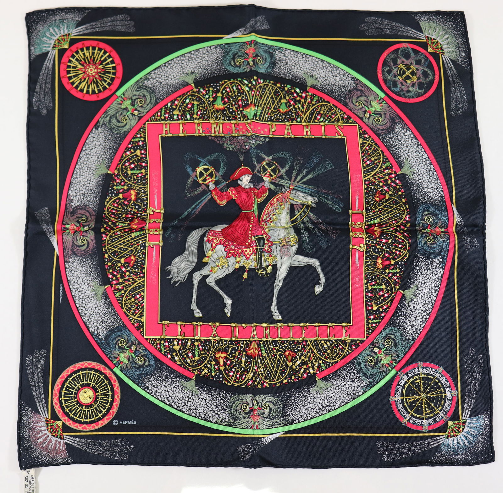 VINTAGE HERMES PARIS SILK SCARF - FEUS D'ARTIFICE: A Hermes silk pocket scarf designed by Michel Duchene. Measures 16.5" x 16.5". With label. Nice condition. *In house shipping available within the US