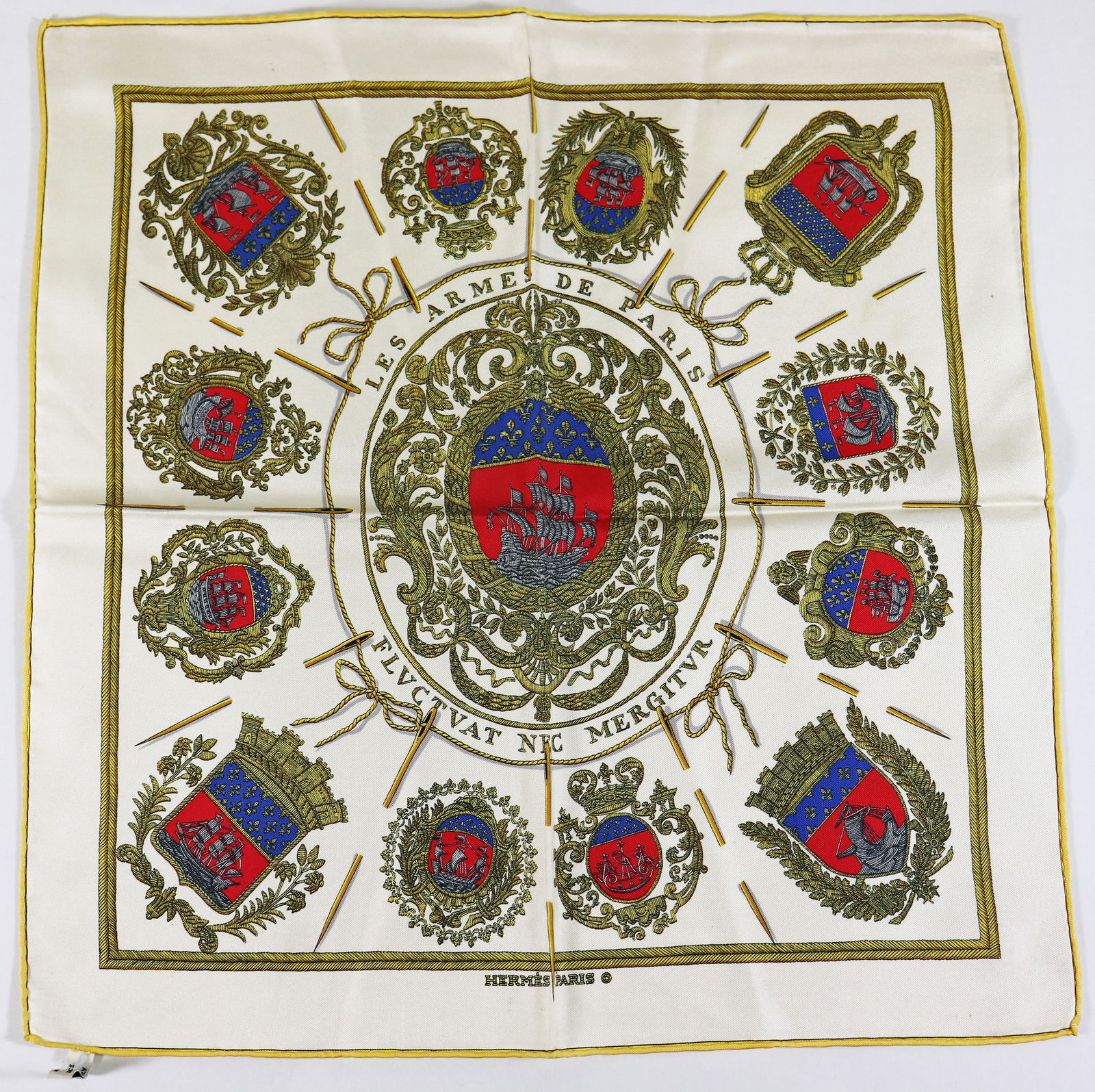 VINTAGE HERMES SILK SCARF - LES ARMES DE PARIS: A rare vintage Hermes pocket silk scarf in nice condition. 16.5" x 16.5". With label. *In house shipping available within the US