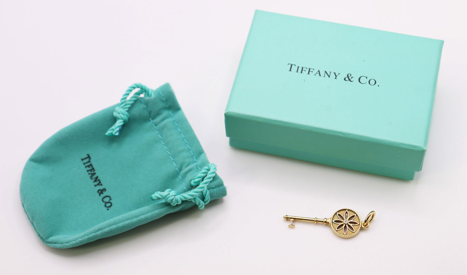 18K TIFFANY & CO. DAISY KEY CHARM PENDANT (1 of 3)