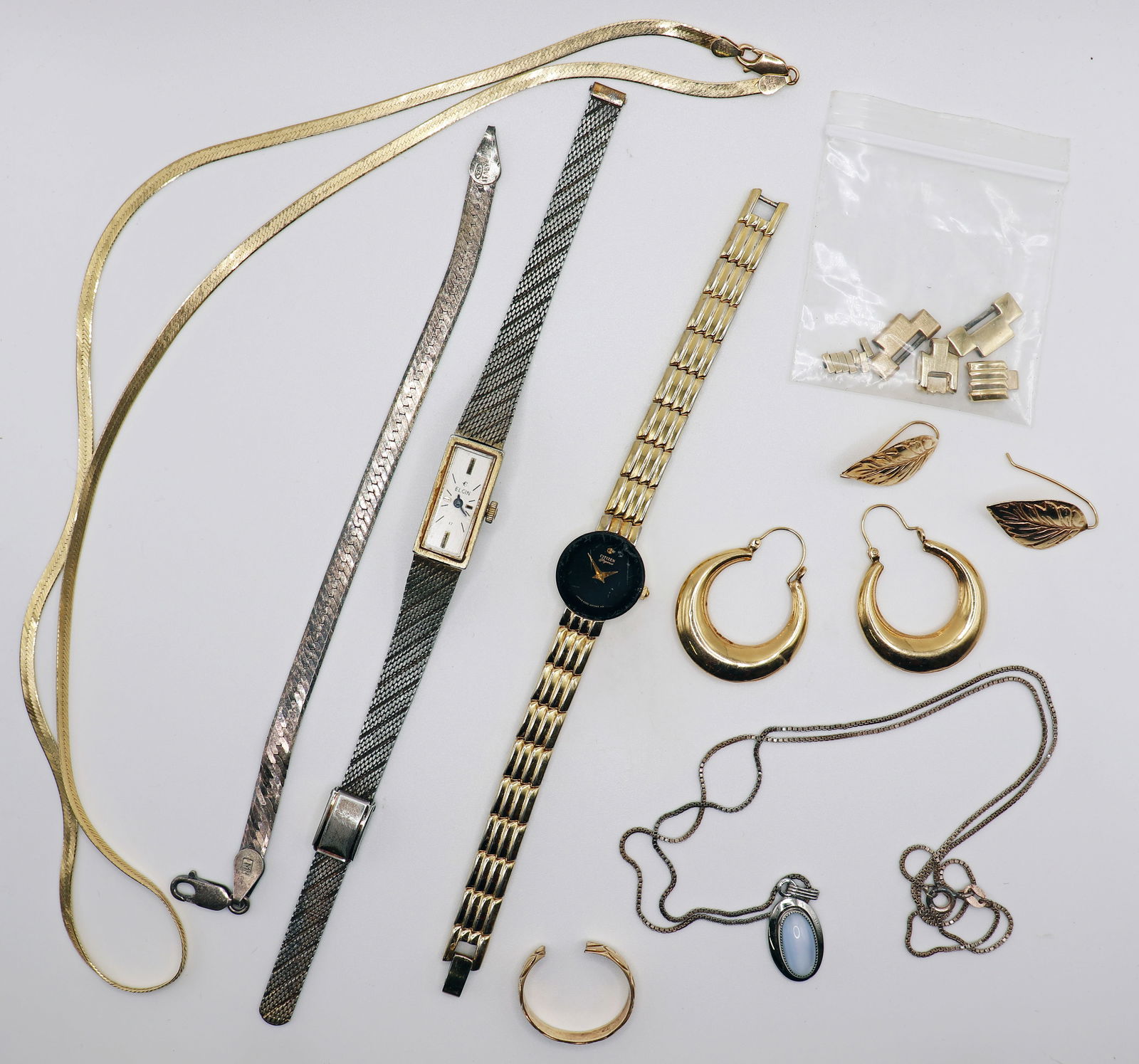 14K GOLD JEWELRY - STERLING - WATCHES: A collection of 14K gold (mostly damaged), a moonstone necklace, sterling bracelet, an Elgin watch and a a Citizens watch. Total gold weight 17.3 g / 11.2 DWT.