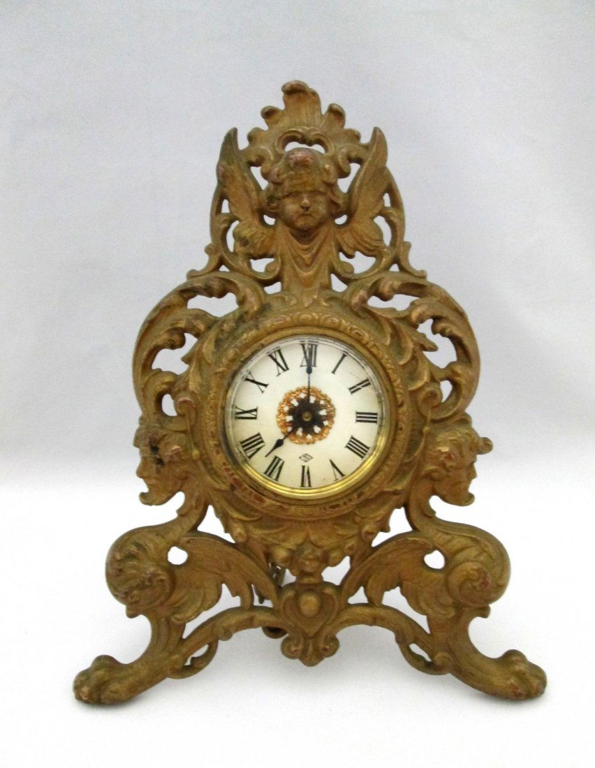 ANTIQUE BRASS CHERUB CLOCK