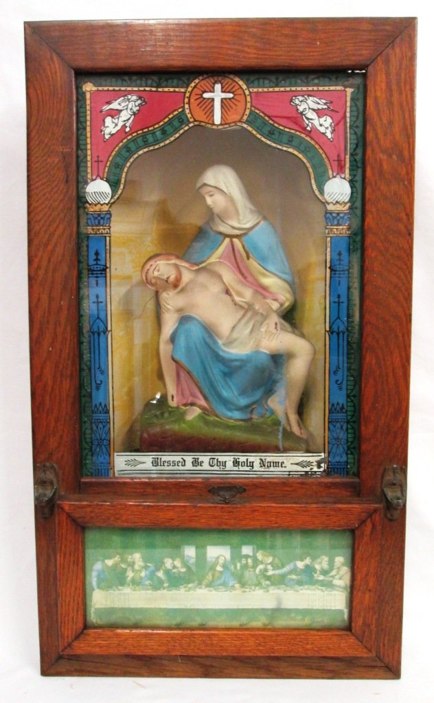 CATHOLIC TRAVELING ALTER: Mary holding Jesus in her arms. Front opens behind the last supper scene Measures 23" x 13" wide 3 1/4" deep. Some damage to back.