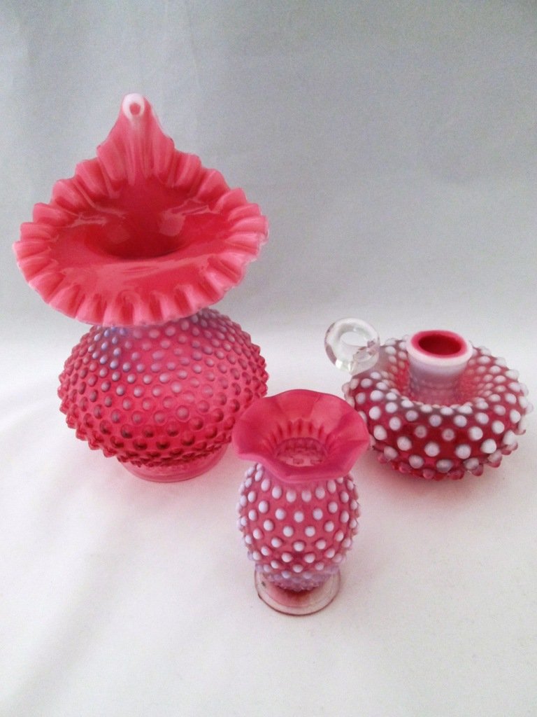 CRANBERRY HOBNAIL GLASS: Tulip vase 8 1/2" tall, small vase 4" tall, and candle holder.