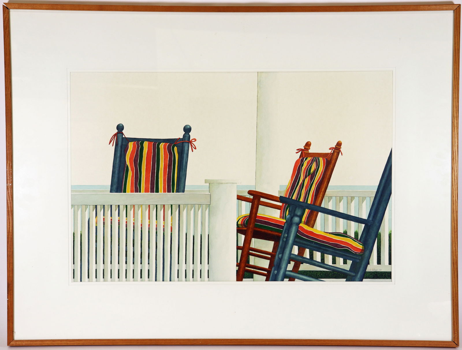 BARBARA SANTA-COLOMA OAK BLUFFS MARTHA'S VINEYARD: Barbara Santa-Coloma watercolor painting of colorful rocking chairs on a porch. Signed lower right. Titled on verso Oak Bluffs Martha's Vineyard. Measures 29" x 19" (sight) and 40.75" x 30.75" framed.