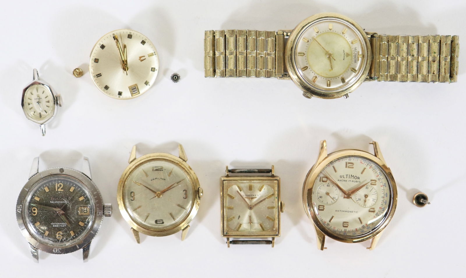 VINTAGE LUXURY WRISTWATCH COLLECTION: A collection of assorted watches to include a Bulova self winding 666 feet waterproof watch, a 10K GF tank style, a 1950's Hamilton gold filled, a 14K gold filled LeCoutre Memovox, an 18K Ultimor Ancr