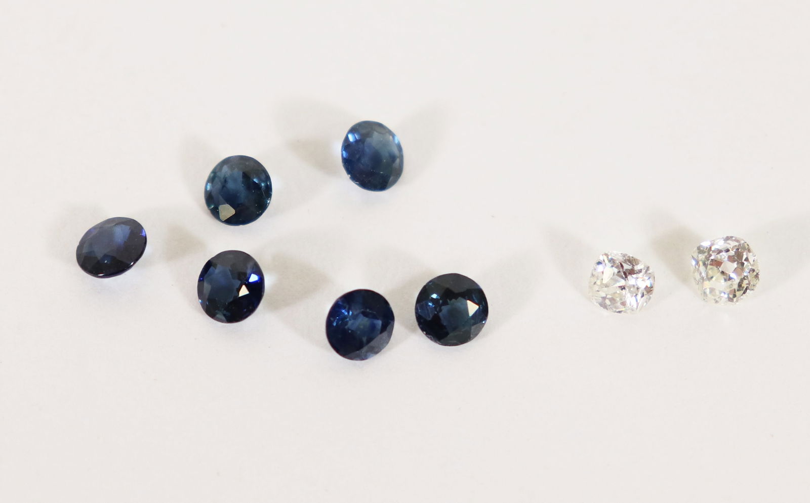 (2) LOOSE MINE CUT DIAMONDS & (6) BURMA SAPPHIRES: (2) old mine cut loose diamonds approx .15 and .20 ct, and 6 round Burmese sapphires approx .20 carat (each).