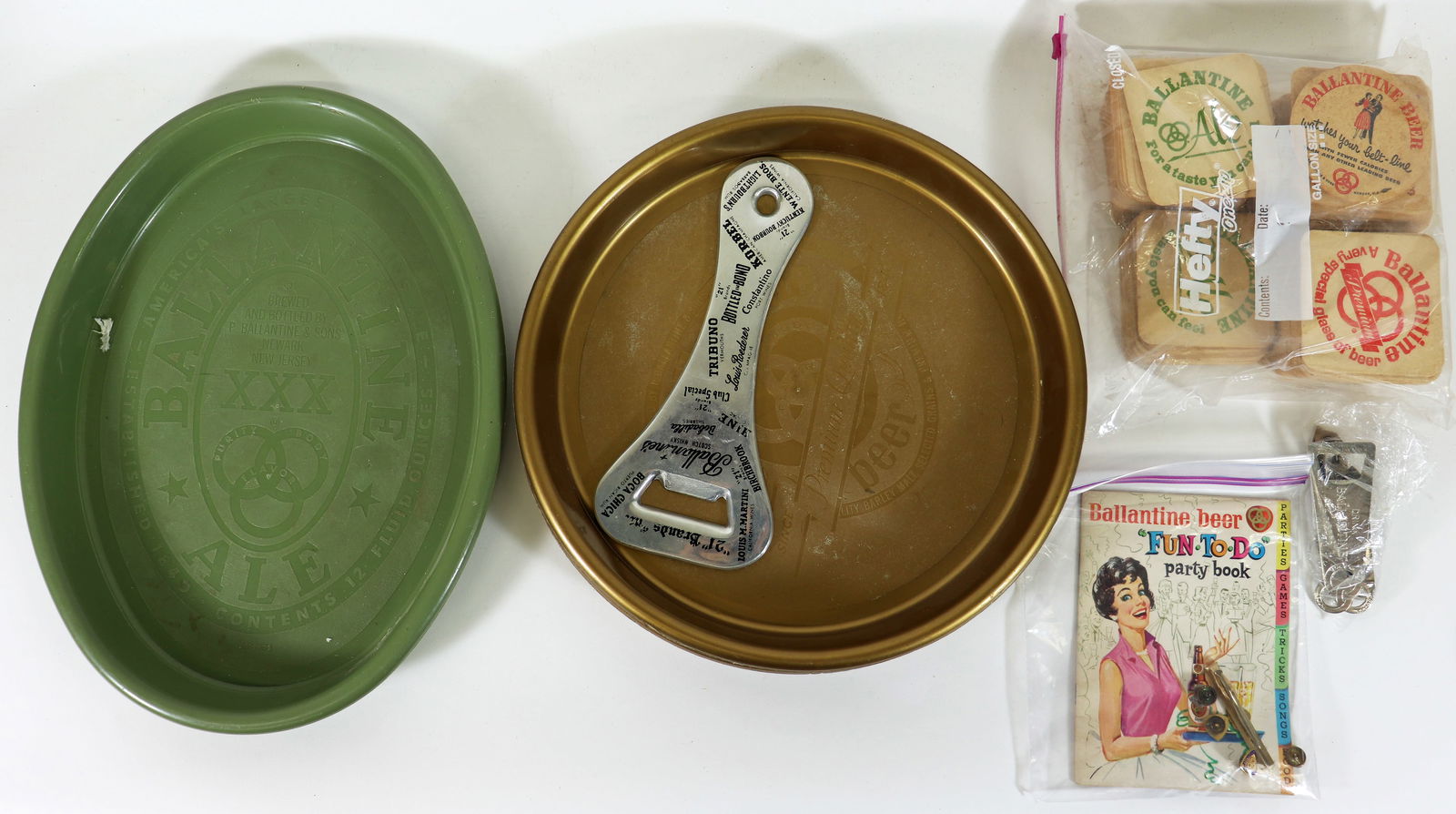 BALLANTINE BEER COLLECTION: Includes a large assortment of Ballantine Ale and beer coasters, service pins (sterling/gold filled /gold),3 trays, a party book and a Club 21 Brands large can open The largest tray measures 15" x 11.