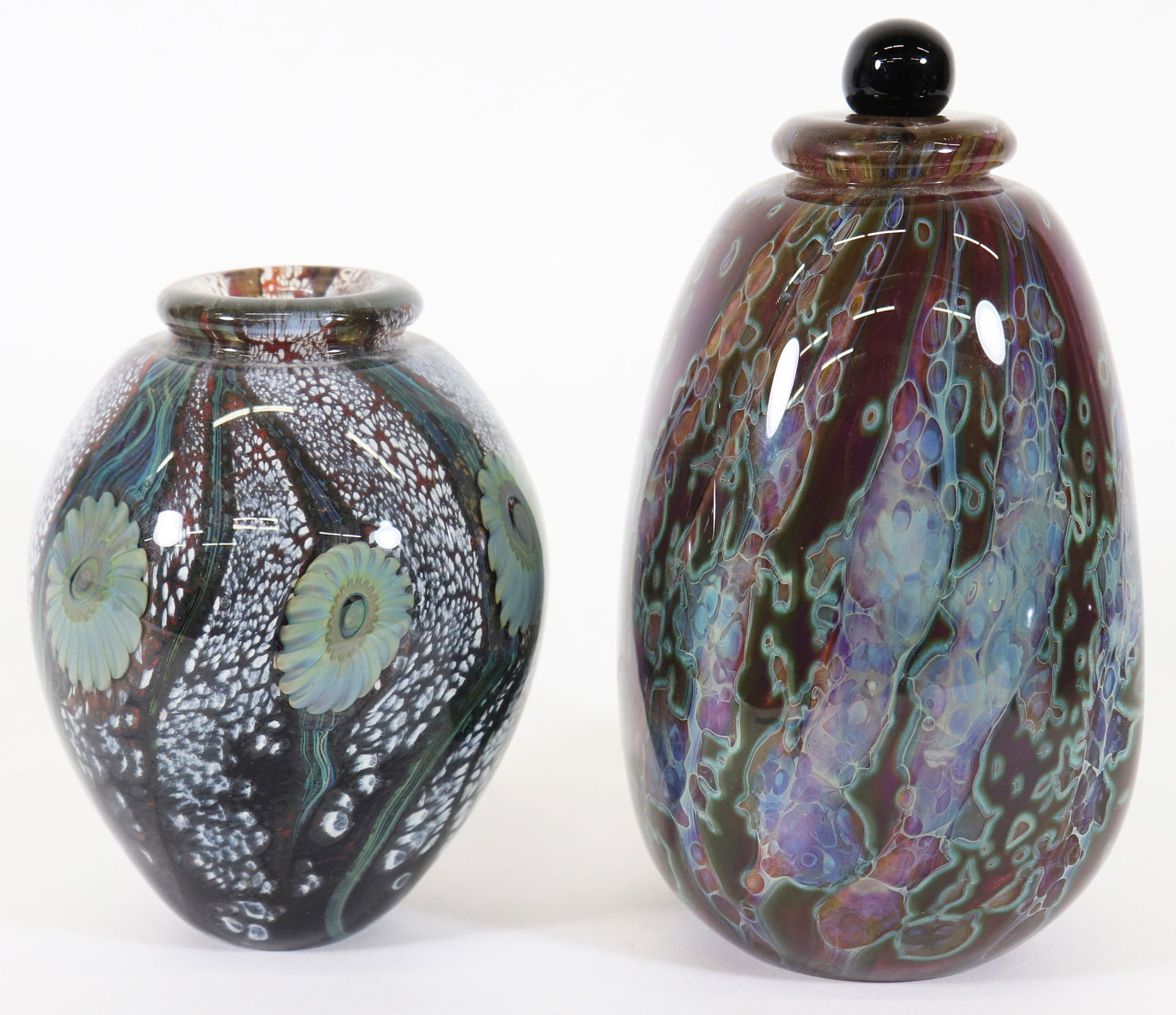 (2) ROBERT EICKHOLT ART GLASS COLLECTION: A pair of signed and dated Robert Eickholt art glass pieces to include a vase signed and dated 2008 5.75" x 4.5" and a perfume flask bottle signed and dated 2008 8" x 5". Ships in a 14" x 14" x 14"