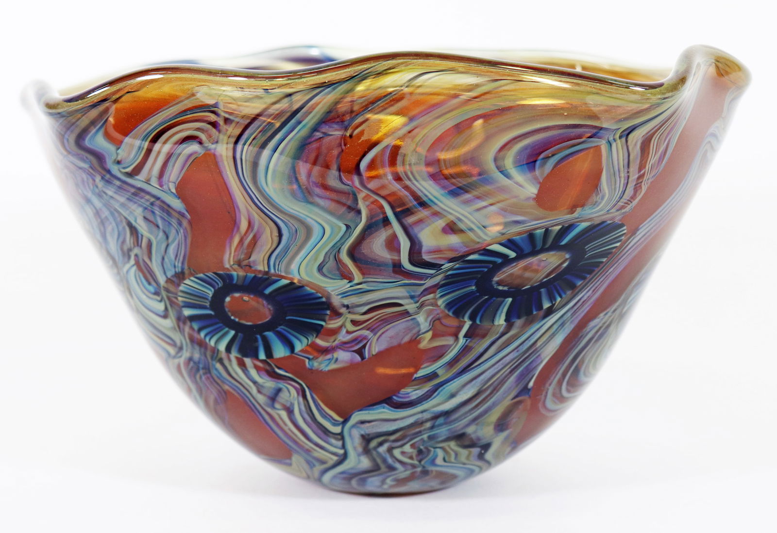 ROBERT EICKHOLT ART GLASS BOWL 2011: A signed and dated art glass bowl by Robert Eickholt. It has a ruffled curved edge. Measures 9.5" x 7.75" x 6". Ships in a 14" x 14" x 14" box.