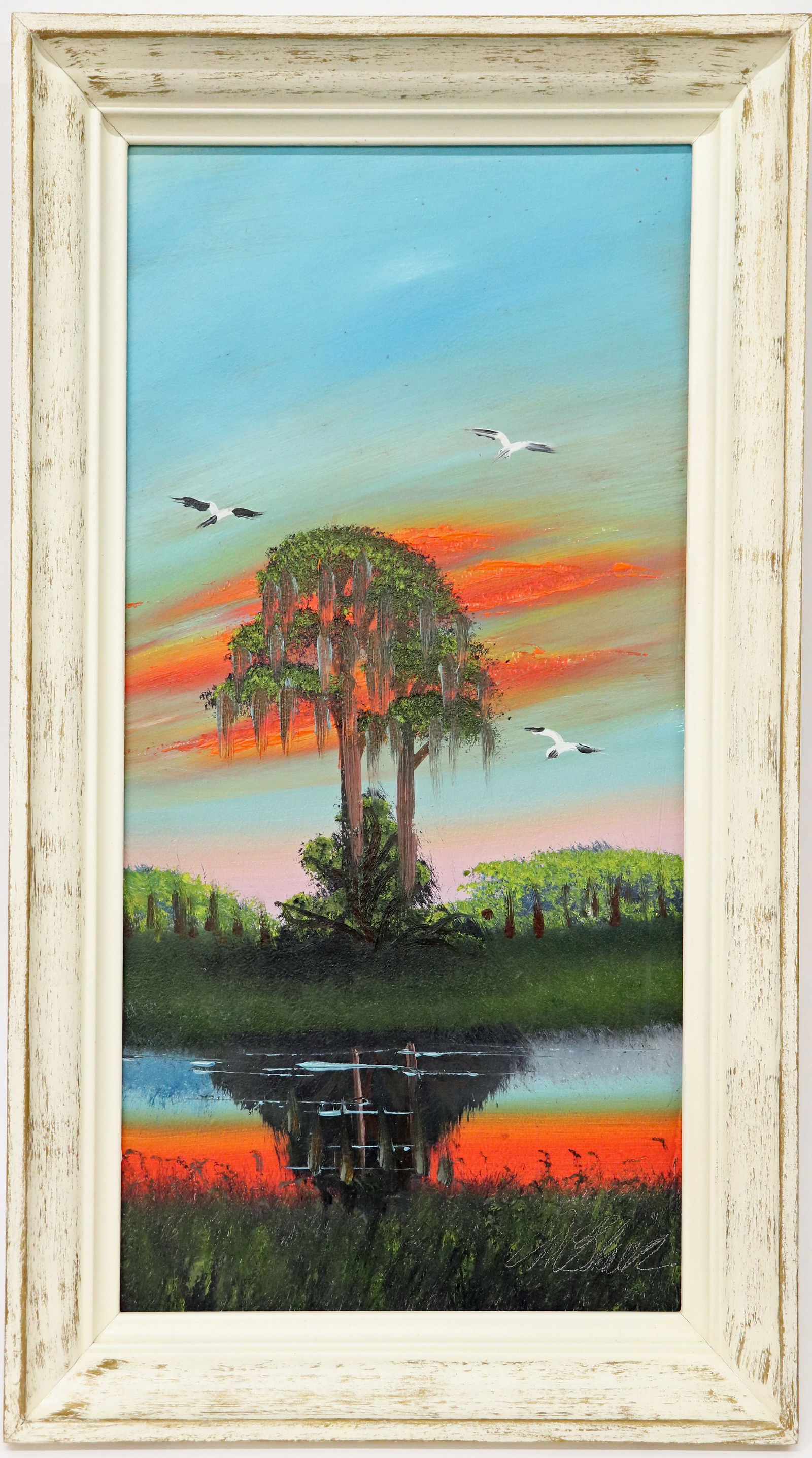 AL BLACK PINES AT SUNSET HIGHWAYMEN PAINTING: Al Black (1945-2025) Highwaymen painting of a backwoods Florida landscape with tall pine trees, green vegetation, birds, water, and blue & red "fire sky" sunset. Signed lower right. Measures 24" x 12"