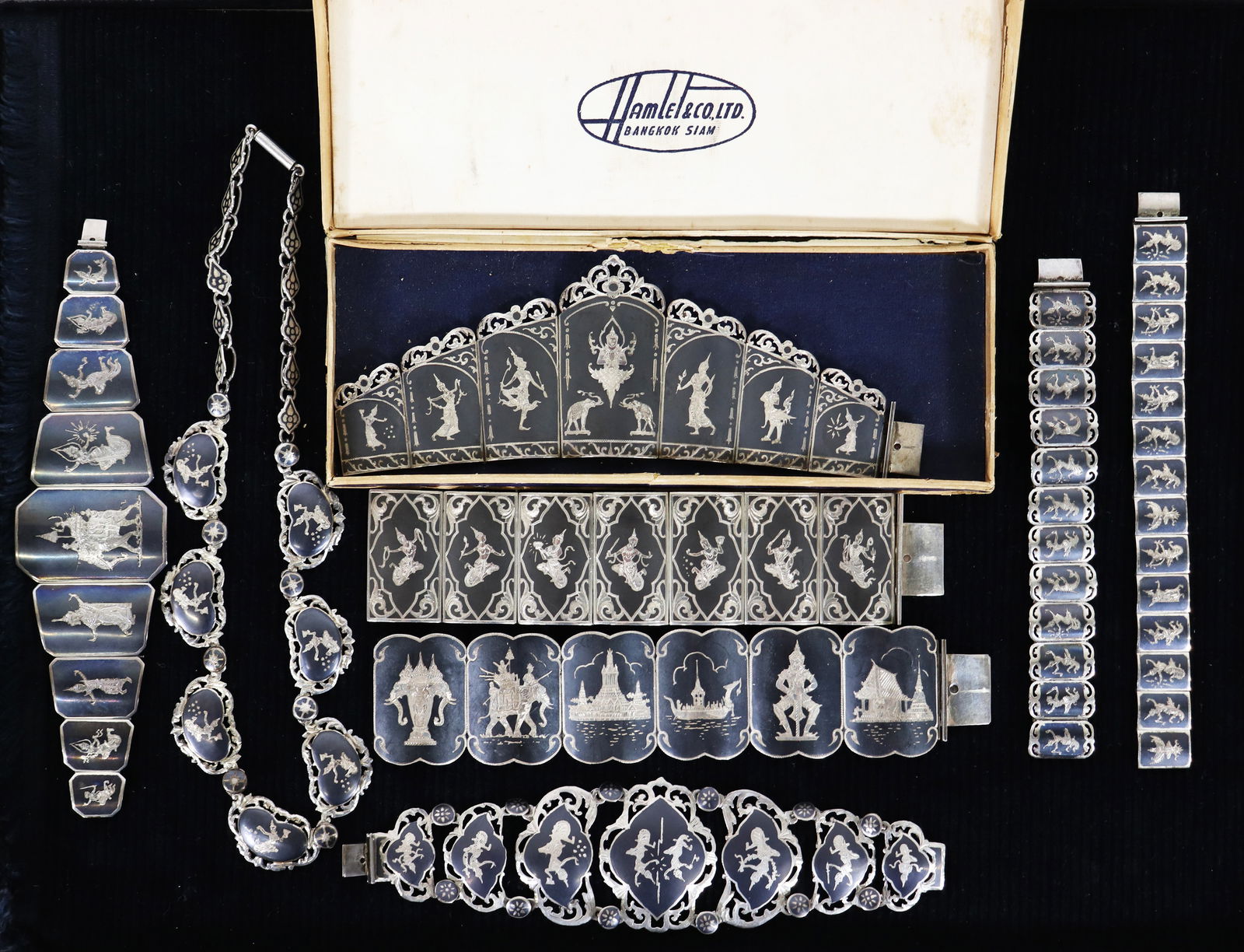 8 PIECES OF SIAM STERLING NIELLO JEWELRY: A collection of Siam sterling jewelry to include 7 bracelets (one with a Hamlet & Co Bangkok Siam box), one marked Ratanabha and a necklace. Total weight 448.9g