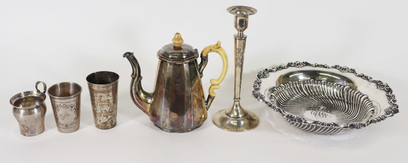 U.S. & EUROPEAN SILVER COLLECTION: Collection includes an American sterling 10.5" round bowl (8.9 OZT 278 grams), 6.5" tall hallmarked teapot (16 OZT 498 grams), (3) small hallmarked beakers (6 OZT 188 grams), and a weighted sterling