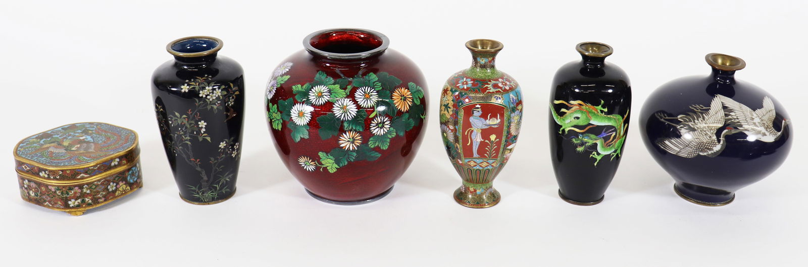 CHINESE / JAPANESE CLOISONNE COLLECTION: A collection of nice antique cloisonne items to include a signed dragon serpent theme vase, a dogwood flower themed vase and paneled Egyptian floral theme vase, a vase with a pair of flying crane bird