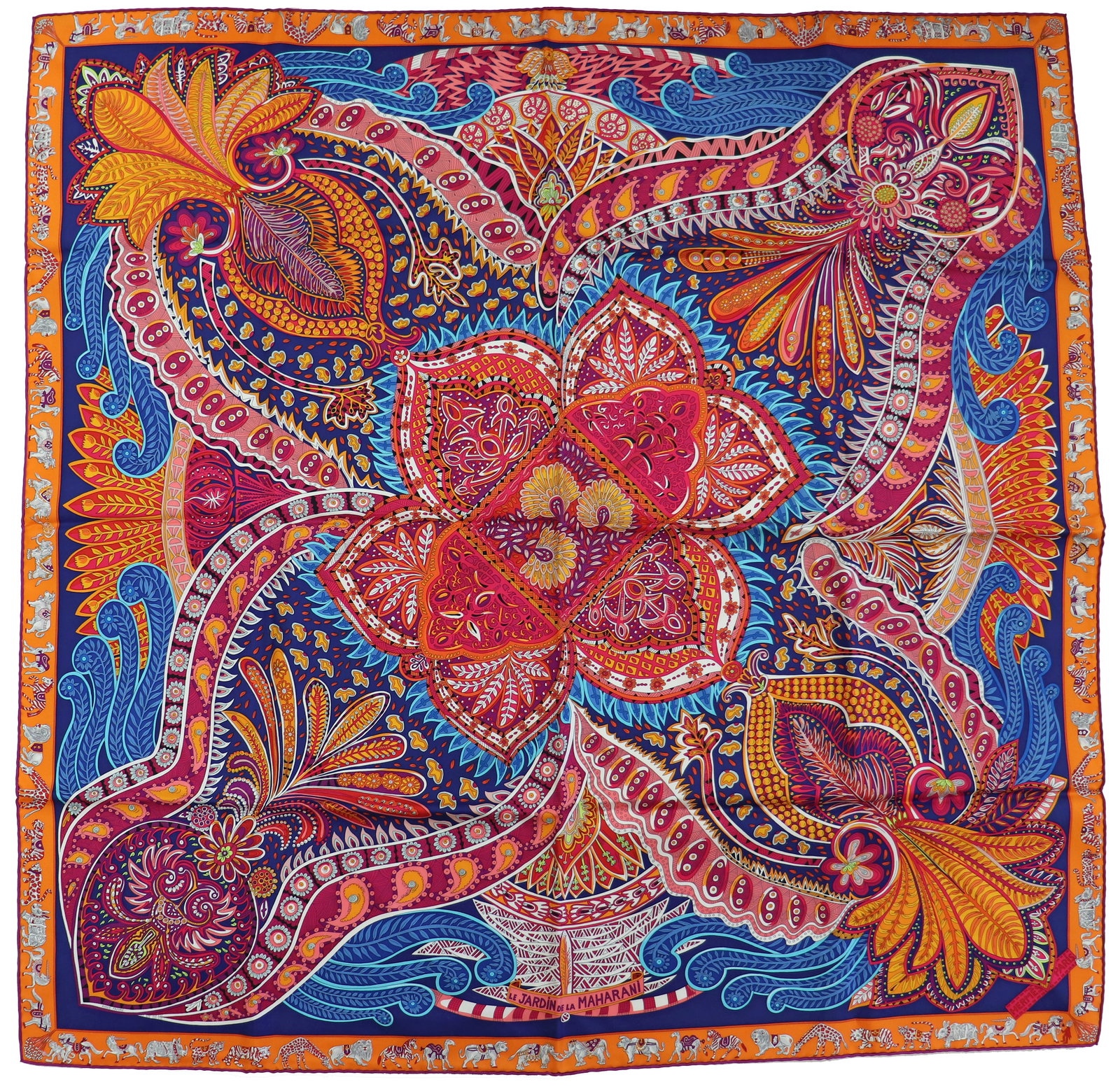 HERMES "LE JARDIN DE LA MAHARANI" SILK SCARF: A Hermes vibrantly colored silk scarf, signed Le Jardin de la Maharani. Hand rolled edges. 35" x 35"