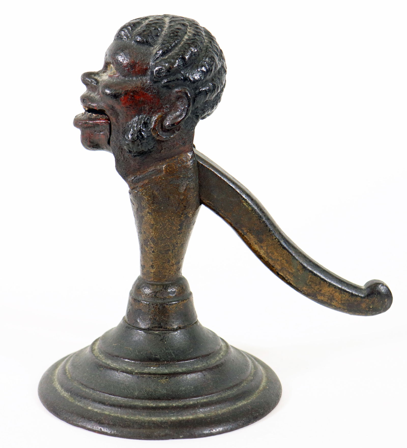 ANTIQUE RARE CAST IRON BLACK AMERICANA NUTCRACKER: Antique Black Americana cast iron figural nutcracker. Measures 7 1/2" x 7" x 4 3/4". Weighs approx 6 lbs.