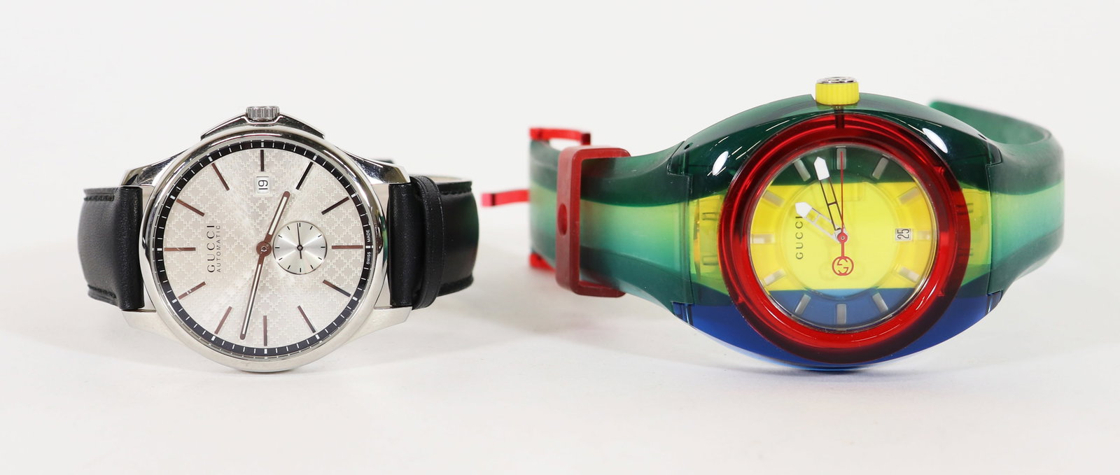 (2) GUCCI WATCHES - G-TIMELESS & SYNC: A Gucci G Timeless Water Resistant 5 ATM watch 34mm with a black leather Gucci band and a Gucci SYNC 137.1water resistant 5 ATM watch 32mm. Both are in working condition.