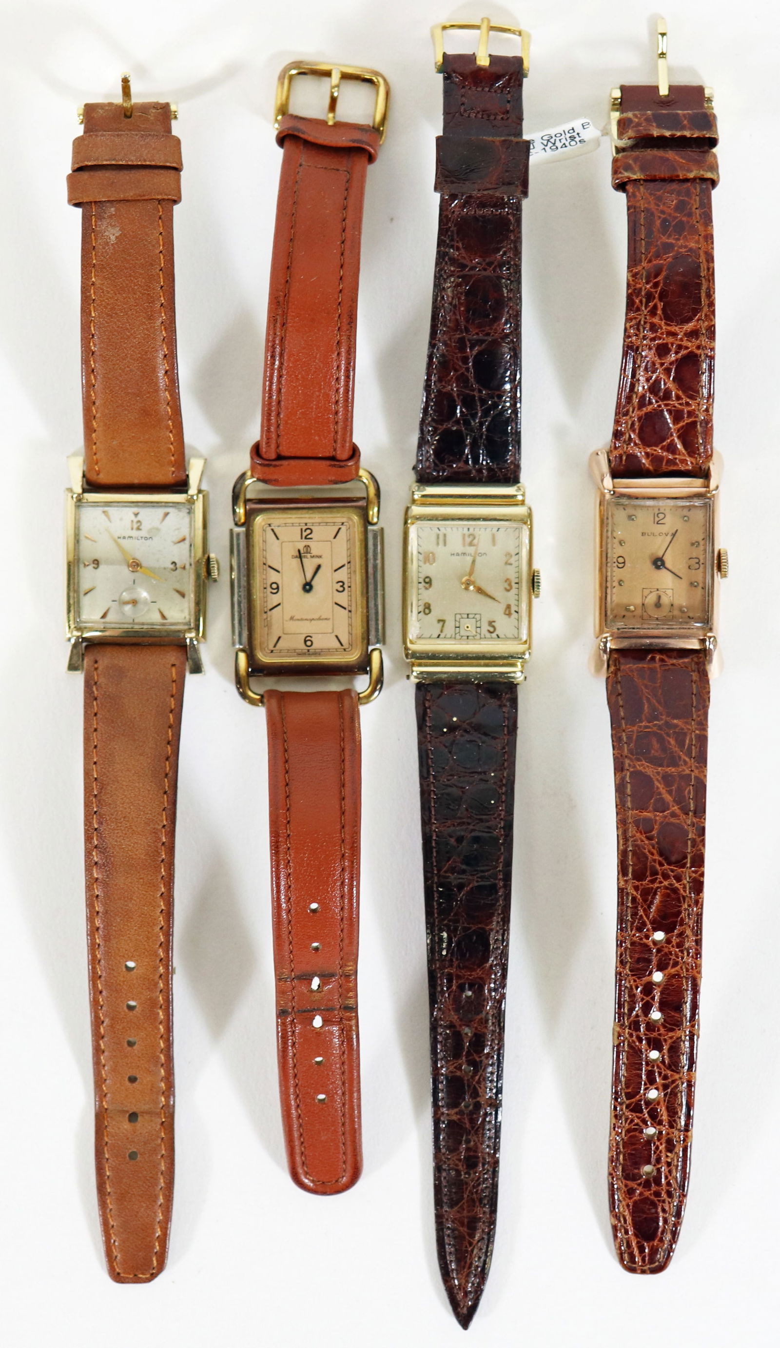 (4) VINTAGE HAMILTON, DANIEL MINK, BULOVA WATCHES: A collection of 4 watches to include a 14K rose gold 1940's 21 jewel Bulova watch, a 14K gold filled Hamilton watch, a Daniel Mink 1026 watch. All were running when inspected.