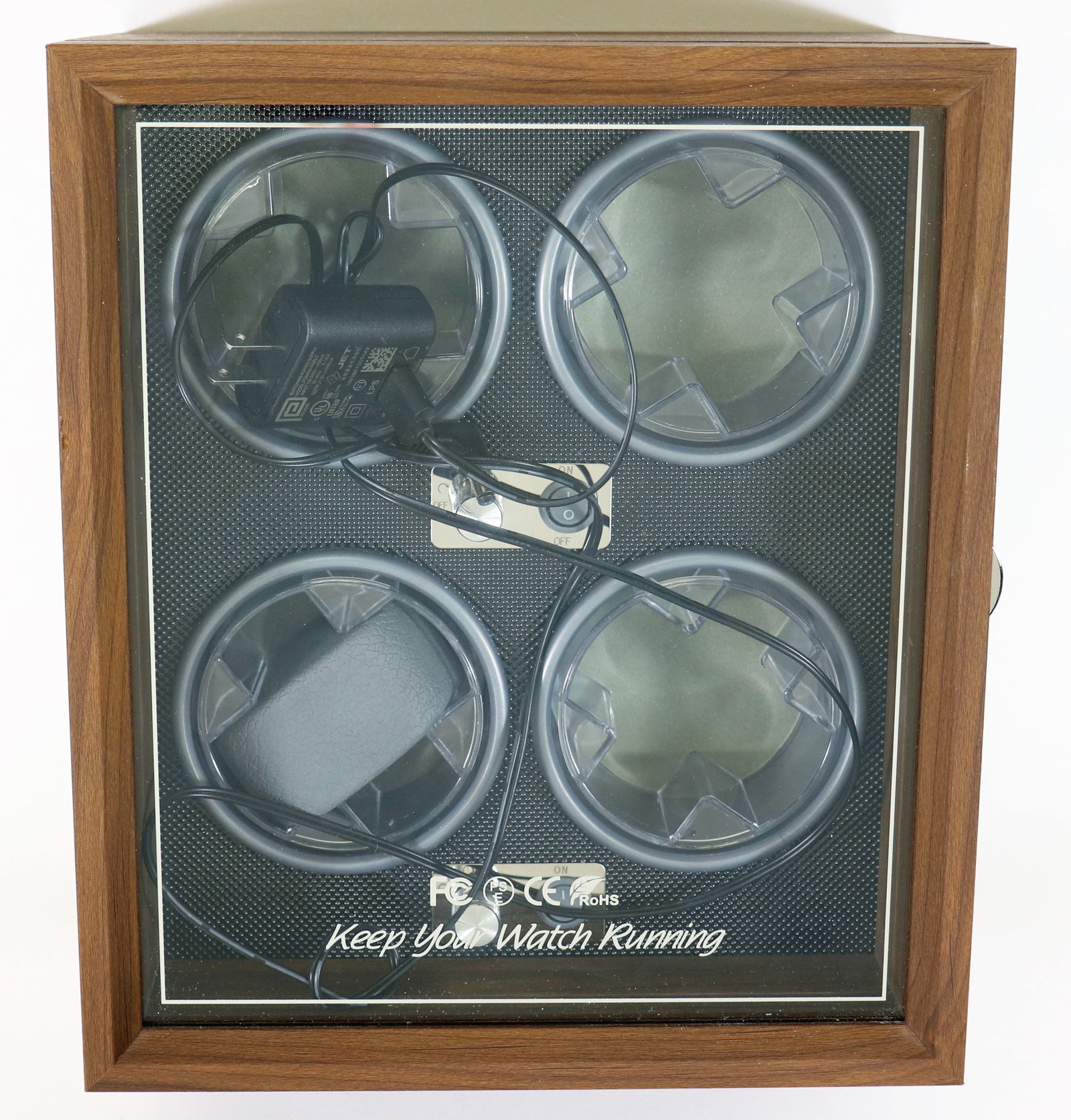 QUAD 4 AUTOMATIC WATCH WINDER BOX: An automatic watch winder for 4 watches. RoHS compliant. An electric winder in a wooden box. Measures 11" x 9.5" x 6"