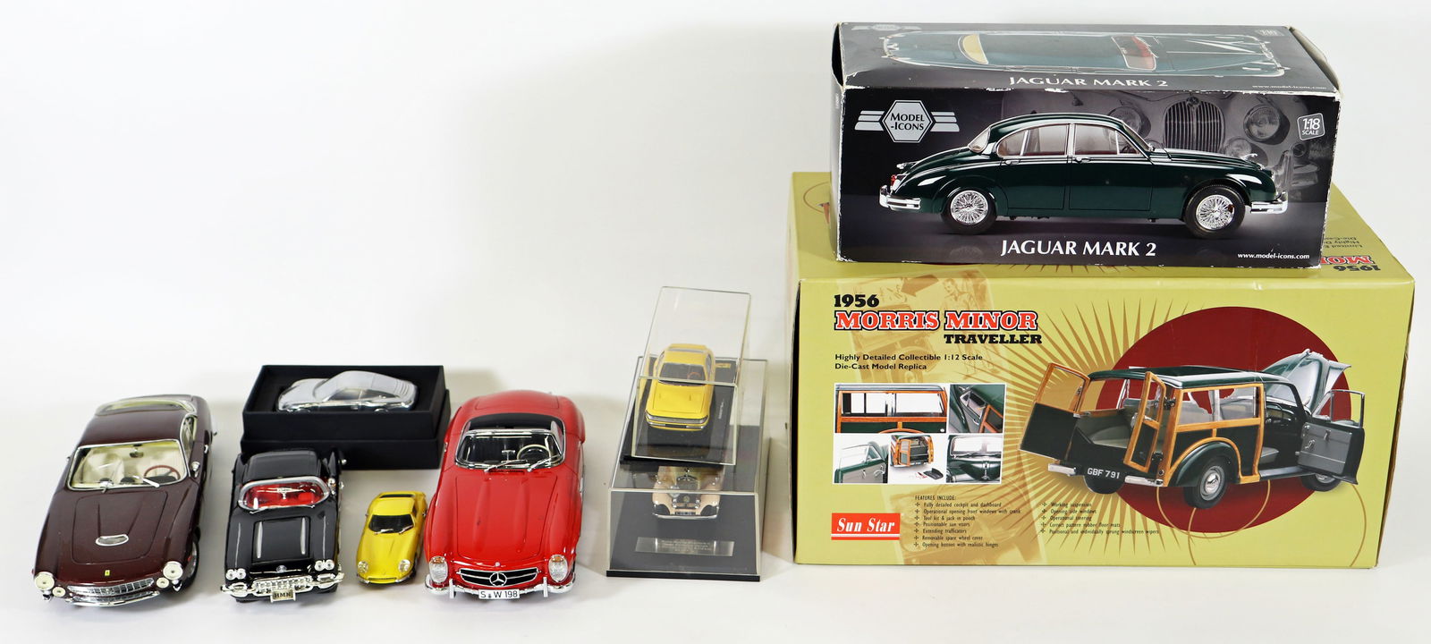 DIECAST MODEL CAR COLLECTION: Model Icon 1962 Jaguar Mark 2 British Racing Green with limited edition certificate model number is 2720, 1:18 scale, in original box and measures 4 1/2" x 12" x 6", Sun Star 1956 Morris Minor