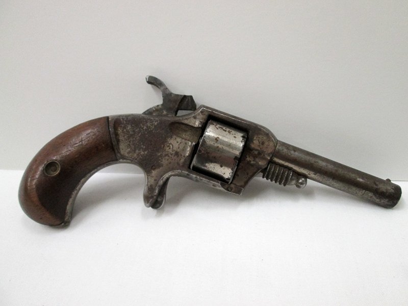 EMPIRE .22 CALIBER REVOLVER: Marked Empire Pat. Nov 21 71' made by Jacob Rupertus Co. Some rust and wear, hammer is loose. Unknown if gun is working. All gun purchases must be transferred through an FFL broker and will not be shi