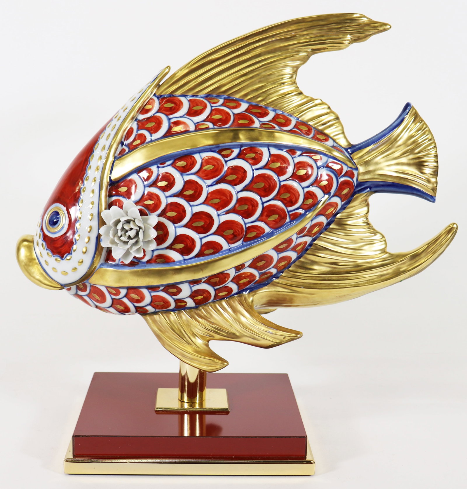 ITALIAN PAINTED RED, GOLD, & WHITE PORCELAIN FISH: Le Porcelian Italian painted red, white, and gold fish sculpture. Measures 13" x 6" wide 13.5" tall.