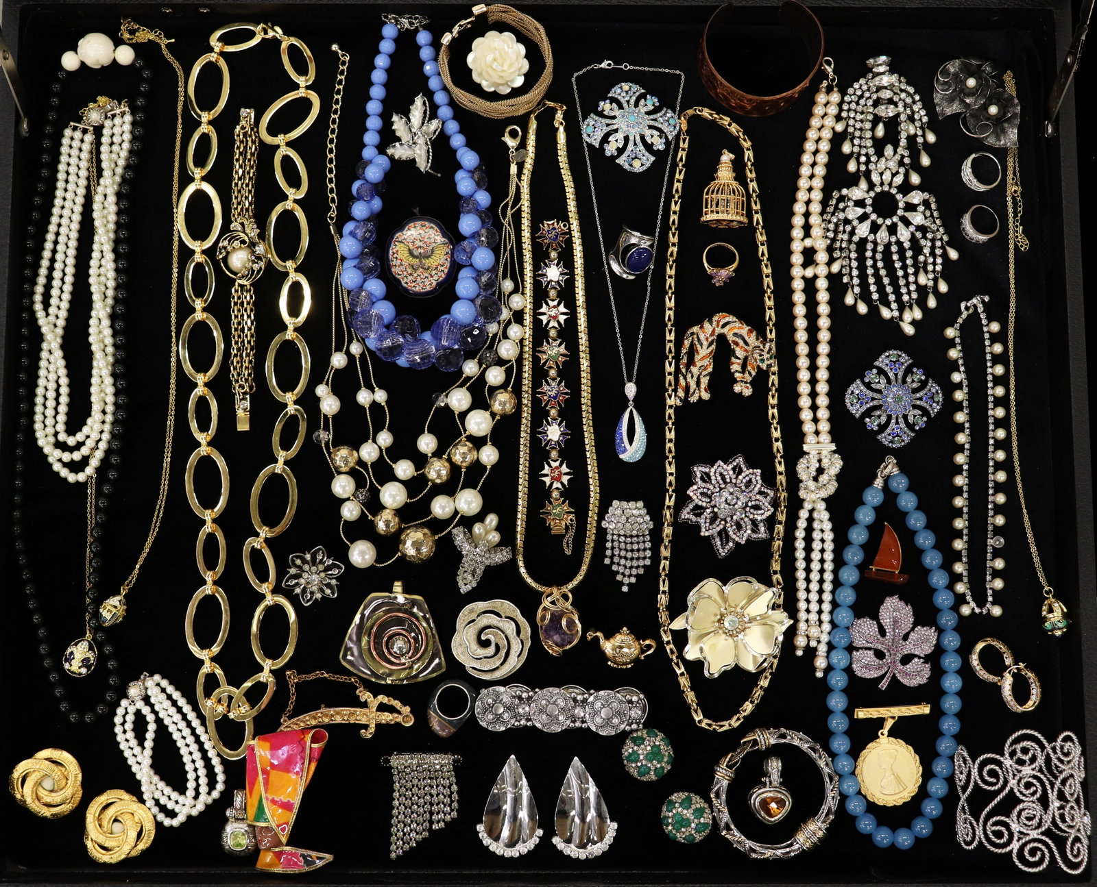 (60+) COSTUME JEWELRY COLLECTION: Eclectic, fun and sparkly costume jewelry collection features over 60 pieces including rings, earrings necklaces, pendants and brooches.