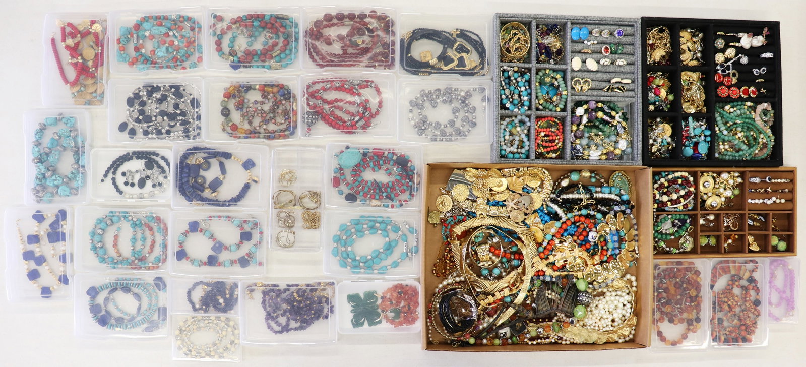 MOM'S CHEST OF COSTUME JEWERLY: A large collection of assorted costume jewelry from a jewelry cabinet. There are all sorts of jewelry to include rings, earrings, necklaces, bracelets and more. Lots of jewelry sets.