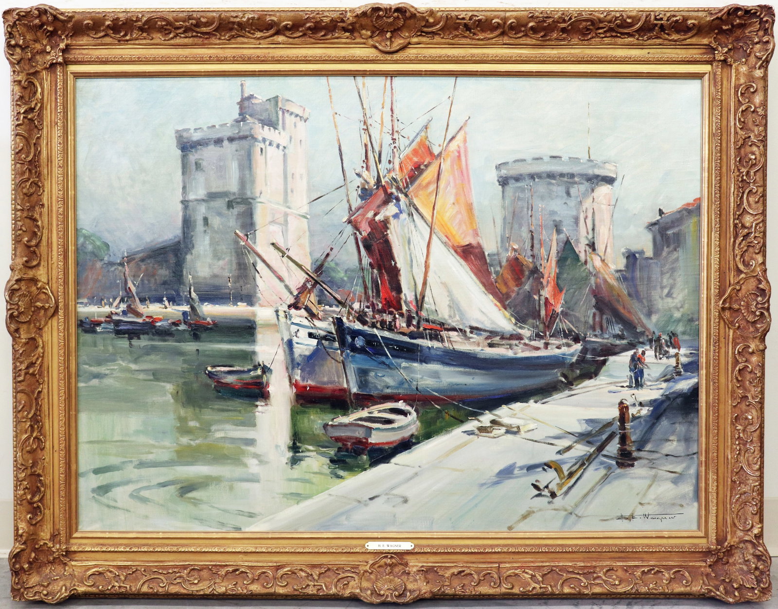 HERMAN WAGNER LA ROCHELLE FRENCH SEAPORT PAINTING: Herman Edouard Wagner (French, 1894-1963) French landscape painting La Rochelle of the seaport with sailboats, The Saint Nicolas Towers of La Rochelle and The Chain Tower. Signed lower right H.E. Wagn