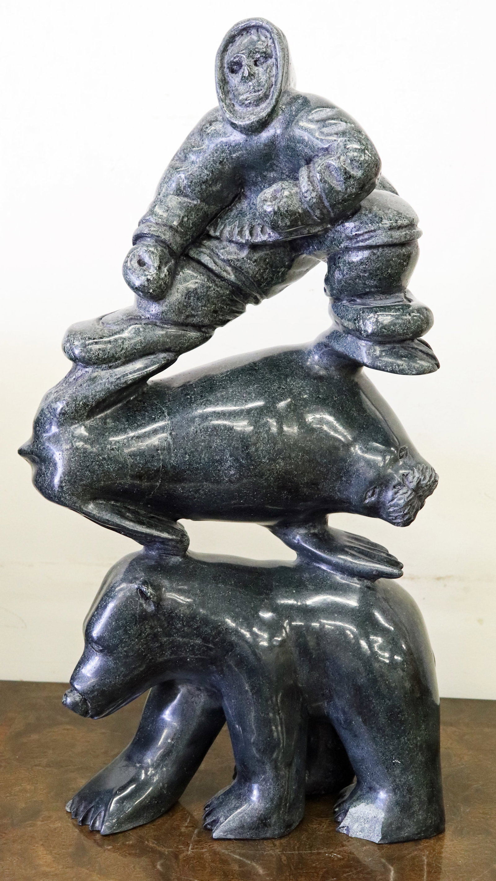 LARGE INUIT STONE CARVING - FIGURE WITH ANIMALS (1 of 7)