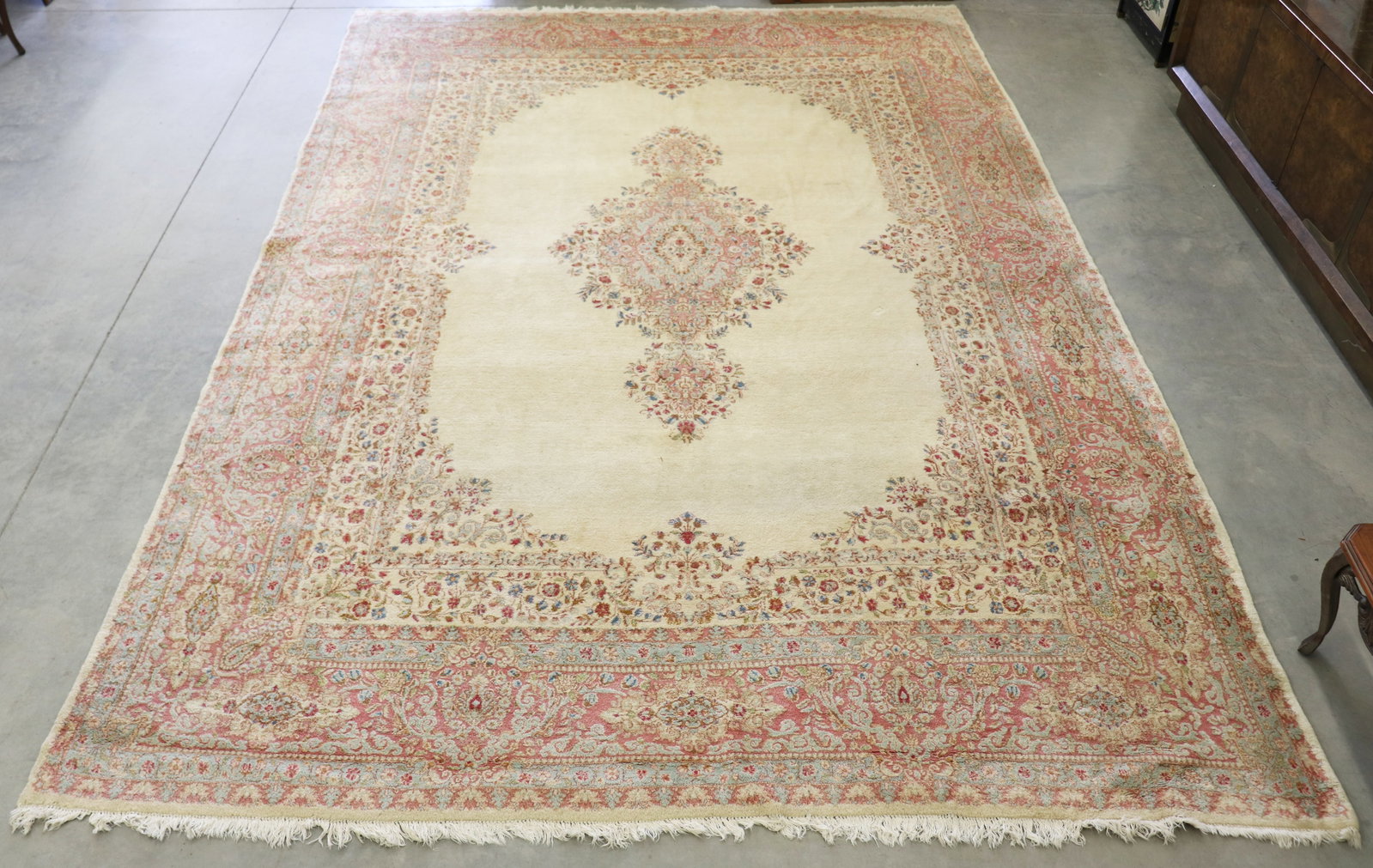 LARGE ORIENTAL HAND WOVEN RUG 14' 7" x 9' 10": Large contemporary hand woven rug. Measures 175" x 118". Some age related wear.