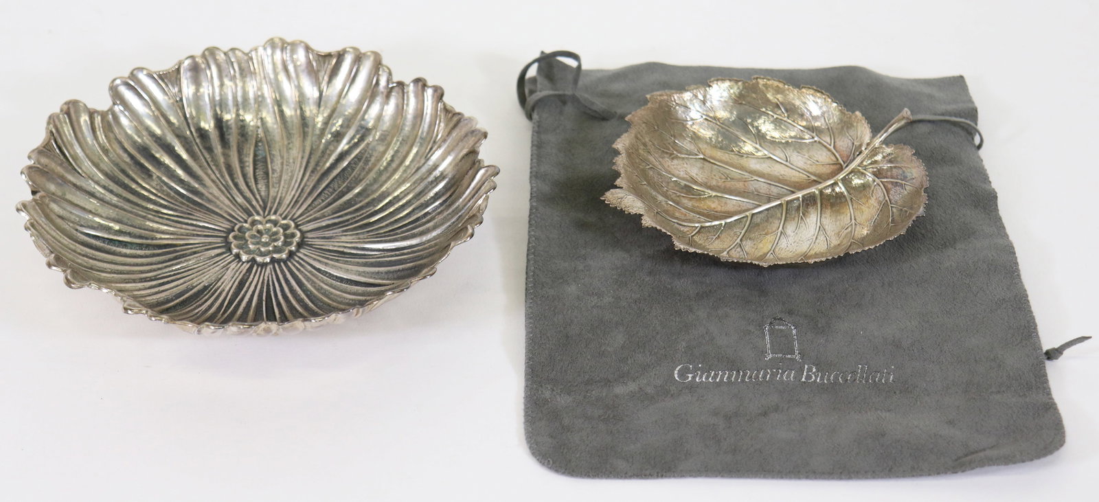BUCCELLATI STERLING SILVER FLOWER & LEAF DISHES: Buccellati sterling silver lotus flower and leaf dishes. Total weight 10.5 OZT (327 grams). 7" and 5.5" x 4.75" wide.
