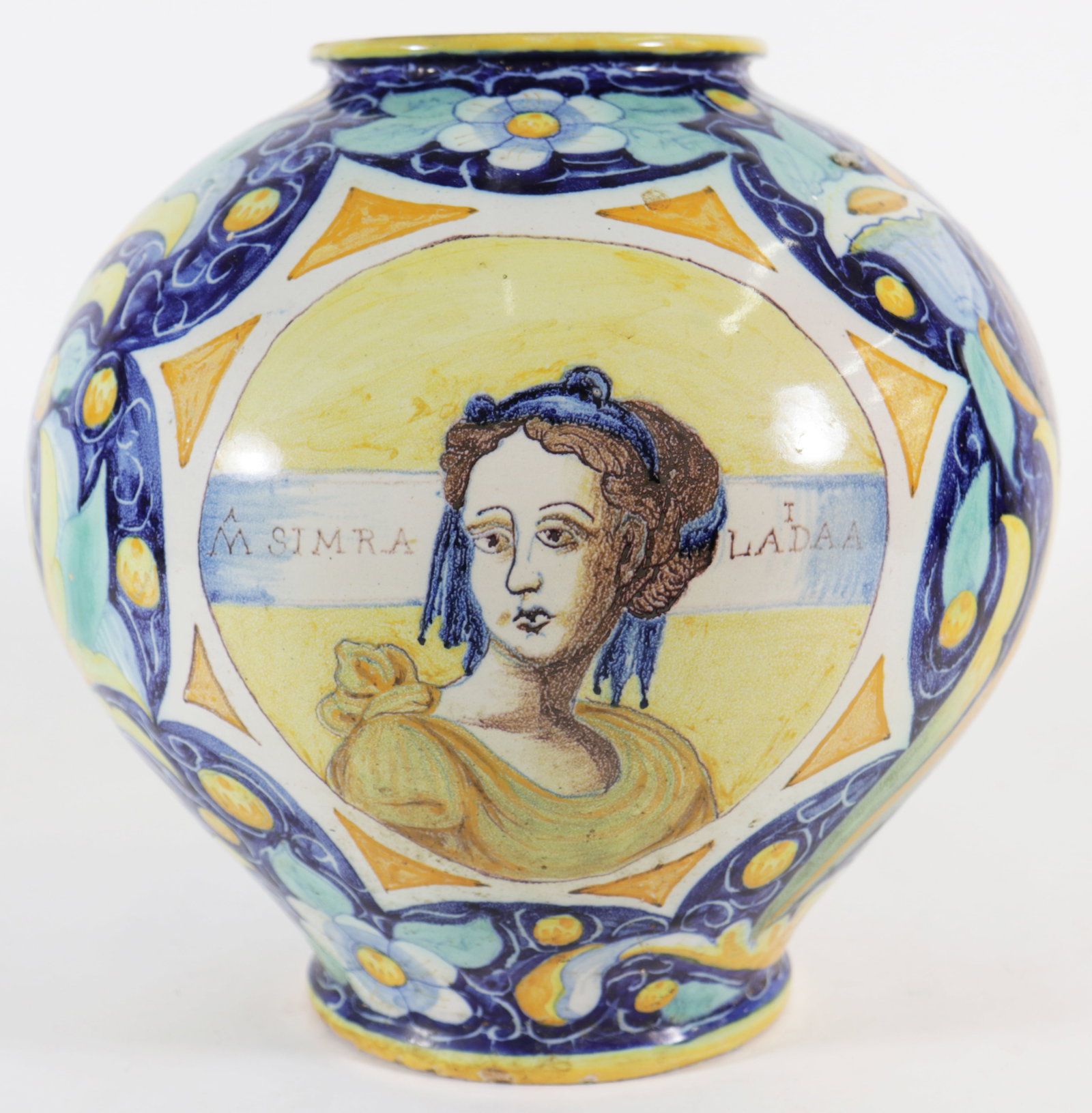 VENETIAN MAJOLICA APOTHECARY PORTRAIT JAR: An antique Italian maiolica polychrome decorated pharmacy jar, attributed to the Maestro Domenica workshop. There is a portrait of a lady on one side that reads, "M Simra Ladaa". Measures approximated